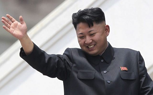 North Korean leader Kim Jong Un waves during a mass military parade, July 27, 2013. (photo credit: AP/Wong Maye-E) North Korean leader Kim Jong Un waves during a mass military parade, July 27, 2013. (photo credit: AP/Wong Maye-E)