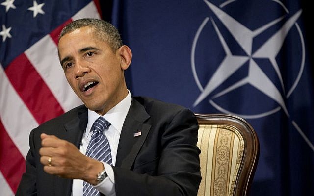 US President Barack Obama at a meeting with NATO Secretary General Anders Fogh Rasmussen (not pictured) in Brussels, Belgium, Wednesday, March 26, 2014 (photo credit: AP/Pablo Martinez Monsivais)