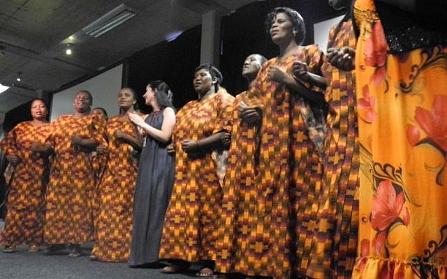 Dr. Daniella Mark (center) sings with the Desmond Tutu HIV Foundation Sizophila Singers, a choir of HIV counsellors from Gugulethu, Cape Town. Counsellors play a vital role in supporting those living with HIV. (courtesy PATA)