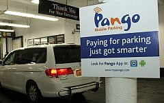 A sign in a New York City parking garage welcoming Pango payments (Courtesy)
