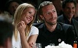 This Jan. 11, 2014 file photo shows actress Gwyneth Paltrow, left, and her husband, singer Chris Martin at the 3rd Annual Sean Penn & Friends Help Haiti Home Gala in Beverly Hills, Calif. Paltrow and Martin are separating after 11 years of marriage. (Photo credit: Colin Young-Wolff /Invision/AP, File)