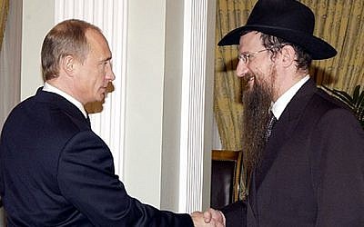 Russian President Vladimir Putin, left, meeting with the Chief Rabbi of Russia Berel Lazar, March 2005. (photo credit: Kremlin/JTA)