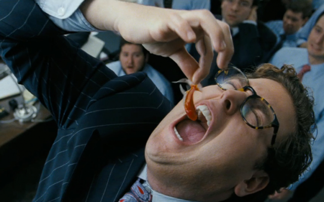 Jonah Hill doing gross things in "The Wolf of Wall Street" (courtesy: Paramount Pictures.)
