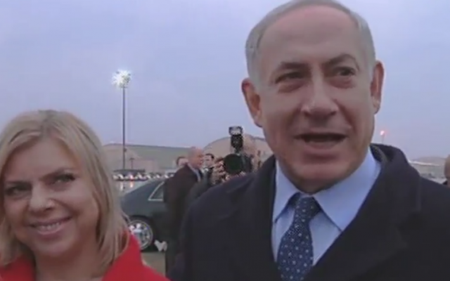 Prime Minister Benjamin Netanyahu, wife Sara at his side, responds to President Barack Obama's criticism on his arrival in the US, March 3, 2014 (photo credit: Channel 2 screenshot) Prime Minister Benjamin Netanyahu, wife Sara at his side, responds to President Barack Obama's criticism on his arrival in the US, March 3, 2014 (photo credit: Channel 2 screenshot)