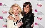 Joan Rivers (left), and daughter Melissa Rivers at the 2013 Matrix New York Women in Communications Awards, in New York, April 22, 2013. (AP/Evan Agostini/Invision)