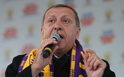 Turkish Prime Minister Recep Tayyip Erdogan addresses supporters in Istanbul, Turkey, on March 29, 2014. (photo credit: AP)