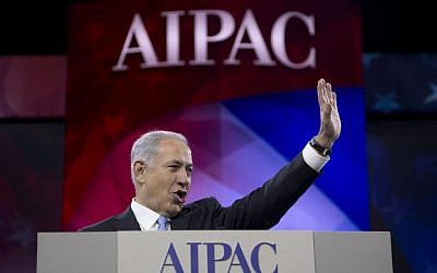 Illustrative: Prime Minister Benjamin Netanyahu waves to the cheering audience as he arrives to speak to the AIPAC meeting at the Washington Convention Center, March 4, 2014, in Washington. (AP/Carolyn Kaster)