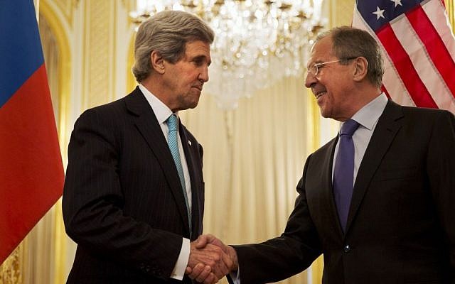 US Secretary of State John Kerry, left, shakes hands with Russian Foreign Minister Sergey Lavrov before the start of their meeting at the Russian Ambassador's residence about the situation in Ukraine, in Paris Sunday March 30, 2014. (photo credit: AP/Jacquelyn Martin, Pool) US Secretary of State John Kerry, left, shakes hands with Russian Foreign Minister Sergey Lavrov before the start of their meeting at the Russian Ambassador's residence about the situation in Ukraine, in Paris Sunday March 30, 2014. (photo credit: AP/Jacquelyn Martin, Pool)