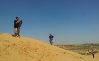 Sandboarding on the dunes (photo credit: Dror BaMidbar)