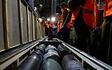 Israeli security forces inspect containers of missiles uncovered onboard the Klos-C earlier this month (photo credit: IDF Spokesperson)