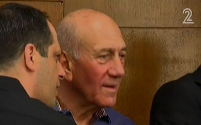 Former prime minister Ehud Olmert at the Tel Aviv District Court on Monday, March 31, 2014 (screen capture: Channel 2) Former prime minister Ehud Olmert at the Tel Aviv District Court on Monday, March 31, 2014 (screen capture: Channel 2)
