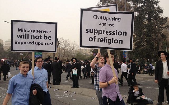 A group of protesters at Sunday's rally against the draft law (photo credit: Mitch Ginsburg/Times of Israel)