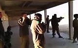 Soldiers at the shooting range. (Screen capture: YouTube)