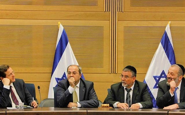MK Aryeh Deri (R), MK Ahmad Tibi (2L), Labor Party head MK Isaac Herzog (L) and MK Yitzhak Vaknin at a meeting of the opposition at the Knesset, March 11, 2014 (photo credit: Miriam Alster/Flash90) MK Aryeh Deri (R), MK Ahmad Tibi (2L), Labor Party head MK Isaac Herzog (L) and MK Yitzhak Vaknin at a meeting of the opposition at the Knesset, March 11, 2014 (photo credit: Miriam Alster/Flash90)