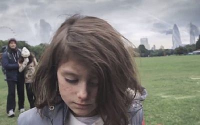 A screenshot from a video by Save The Children UK· showing a young British girl enduring circumstances similar to those endured by Syrian children in the course of one year. (screen capture, YouTube)