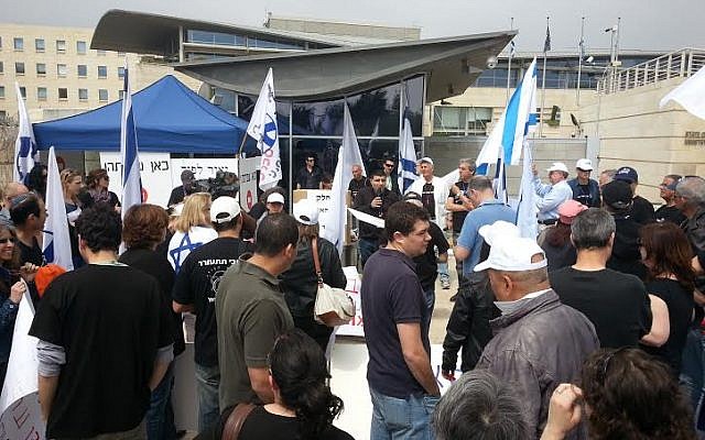 Striking workers outside the Foreign Ministry in Jerusalem, on March 25, 2104. (photo credit: courtesy) Striking workers outside the Foreign Ministry in Jerusalem, on March 25, 2104. (photo credit: courtesy)