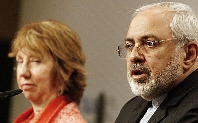 Iran's Foreign Minister Mohammad Javad Zarif, right, speaks during a joint press conference with EU foreign policy chief Catherine Ashton, at UN Headquarters in Vienna, Austria, in April 2014 (photo credit: AFP/Dieter Nagl)