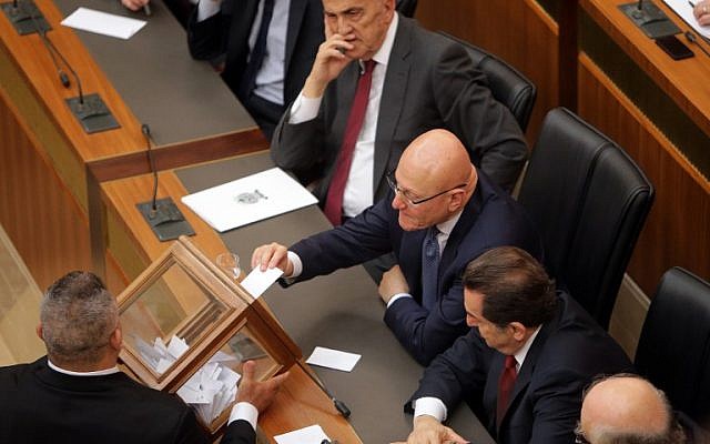 Lebanese Prime Minister Tammam Salam (C) casts his vote to elect the new Lebanese president in the parliament building in downtown Beirut on April 23, 2014. (photo credit: AFP PHOTO/JOSEPH EID/POOL) Lebanese Prime Minister Tammam Salam (C) casts his vote to elect the new Lebanese president in the parliament building in downtown Beirut on April 23, 2014. (photo credit: AFP PHOTO/JOSEPH EID/POOL)