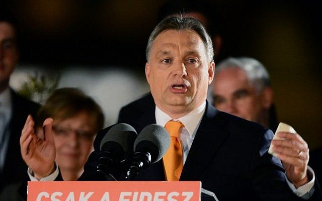 Hungarian Prime Minister Viktor Orban delivers a speech after winning the parliamentary election with members of his FIDESZ party on April 6, 2014 in Budapest . (photo credit: AFP/ATTILA KISBENEDEK) Hungarian Prime Minister Viktor Orban delivers a speech after winning the parliamentary election with members of his FIDESZ party on April 6, 2014 in Budapest . (photo credit: AFP/ATTILA KISBENEDEK)
