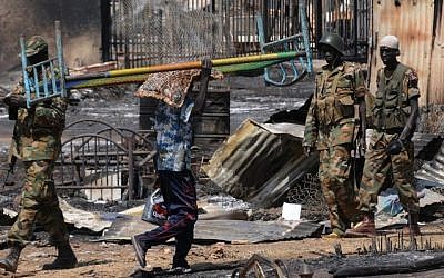 South Sudan national army soldiers patrolling the town of Bentiu, April 2014. (Simon Maina/AFP)