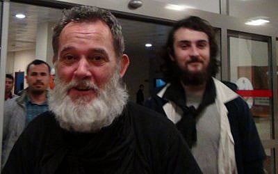 A screen-grab taken on April 19, 2014, from a video released by Dogan News Agency shows (from L) Liberation newspaper journalist Didier Francois and French freelance photographer Edouard Elias (photo credit: AFP/DOGAN NEWS AGENCY )