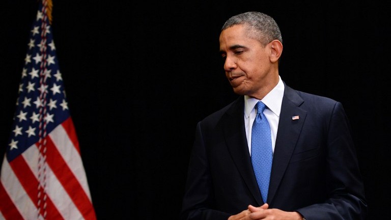 US President Barack Obama departs after making a statement to the press on April 2, 2014 in Chicago, Illinois, on the shooting at the Fort Hood military base in Texas. (photo credit: AFP/Jewel Samad) US President Barack Obama departs after making a statement to the press on April 2, 2014 in Chicago, Illinois, on the shooting at the Fort Hood military base in Texas. (photo credit: AFP/Jewel Samad)