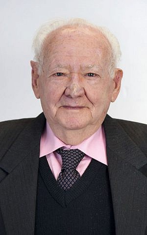 Arthur Aud, now 84, said he looked like a 'sheygetz,' a non-Jewish boy, with his blonde hair and blue eyes, factors that probably helped him survive the Holocaust (Courtesy Yad Vashem)