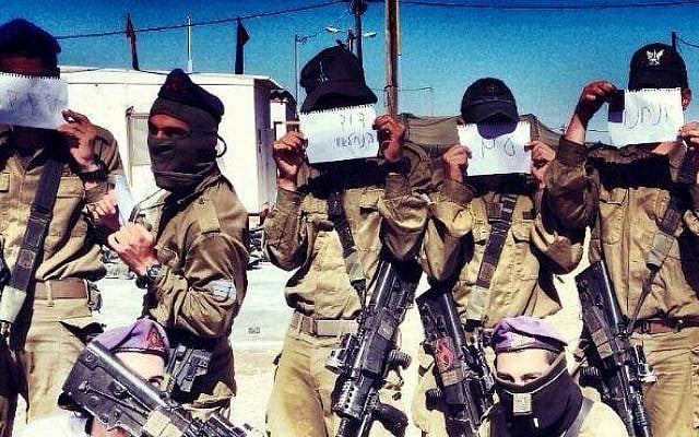 Soldiers hold signs supporting "David from the Nahal Brigade" (photo credit: Facebook)