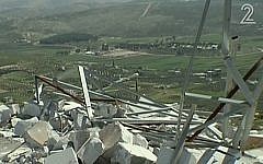 An IDF outpost destroyed by settlers in the West Bank settlement of Yitzhar, April 2014. (screen capture: Channel 2)