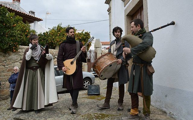 Actors entertaining visitors to the Jewish Christian Passover Celebration last month at Medelim, Portugal. (Beira Baixa TV via JTA)