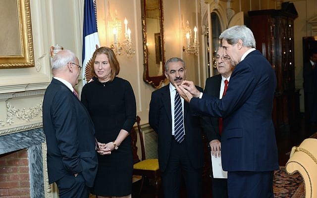 John Kerry (right), with the Israeli and Palestinian negotiating teams at the start of talks in Washington in July 2013 (photo credit: US State Department) John Kerry (right), with the Israeli and Palestinian negotiating teams at the start of talks in Washington in July 2013 (photo credit: US State Department)