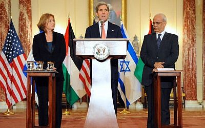 US Secretary of State John Kerry stands with Justice Minister Tzipi Livni, Israel's chief negotiator (left), and Palestinian chief negotiator Saeb Erekat, after the resumption of Israeli-Palestinian peace talks, July 30, 2013, at the State Department in Washington. (photo credit: US State Department)