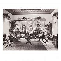 Swedish Colony members lounging in the salon [Pasha Room] in spring 1897, with its original hand-painted wooden ceiling, considered one of the oldest in the Middle East. (photo credit: American Colony Photo Department photographers/from members and activities of the American Colony, American Colony Archive Collections)