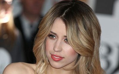 Peaches Geldof arrives at the BRIT Awards 2014 at the O2 Arena in London on Wednesday, Feb. 19, 2014. (Photo credit: Jon Furniss Photography/Invision/AP)