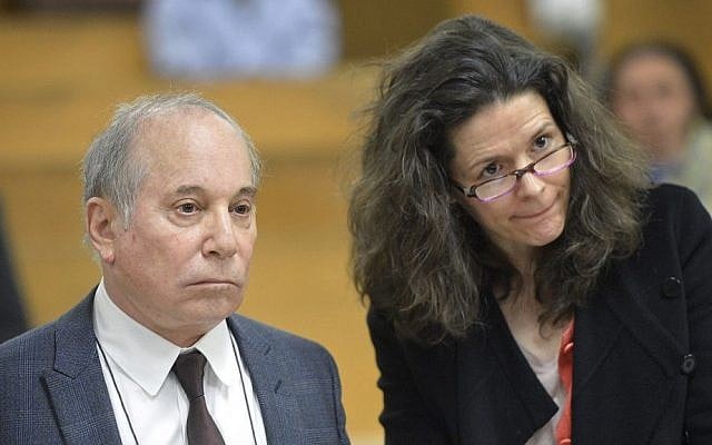 Singer Paul Simon, left, and his wife Edie Brickell appear at a hearing in Norwalk Superior Court on Monday April 28, 2014 in Norwalk, Conn. (photo credit: AP/The Hour, Alex von Kleydorff/Pool) Singer Paul Simon, left, and his wife Edie Brickell appear at a hearing in Norwalk Superior Court on Monday April 28, 2014 in Norwalk, Conn. (photo credit: AP/The Hour, Alex von Kleydorff/Pool)
