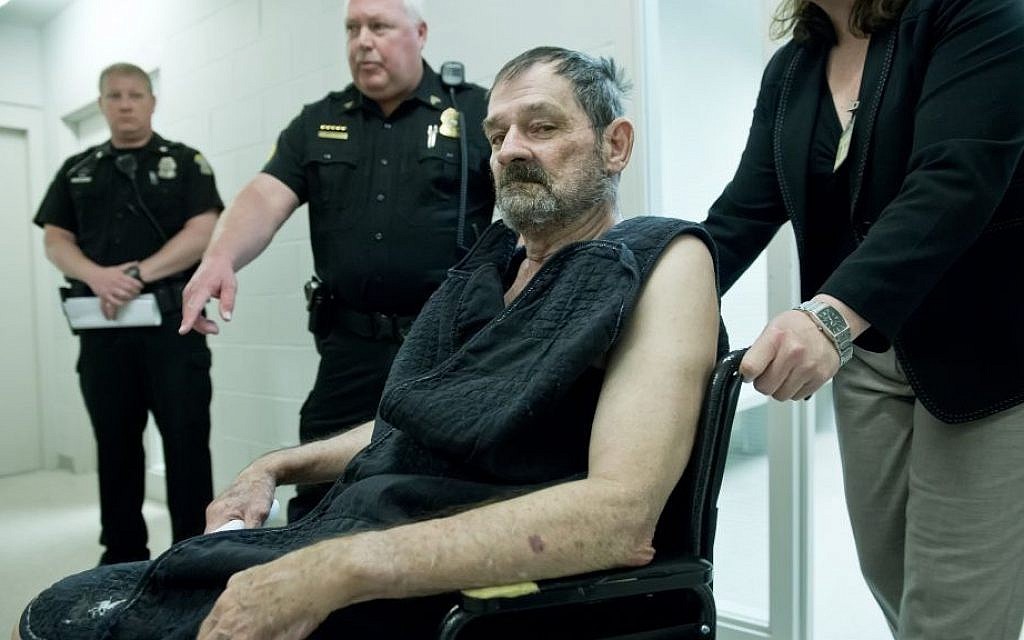 Overland Park JCC shooter Frazier Glenn Cross Jr., also known as Frazier Glenn Miller Jr., appears at his arraignment in New Century, Kansas, April 15, 2014. (photo credit: AP/David Eulitt) Overland Park JCC shooter Frazier Glenn Cross Jr., also known as Frazier Glenn Miller Jr., appears at his arraignment in New Century, Kansas, April 15, 2014. (photo credit: AP/David Eulitt)