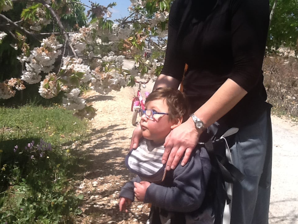 Four-year-old Amichai Avner, of Psagot, is able to walk for the first time using the Upsee. (Photo courtesy of Nomi Avner)