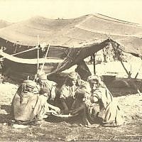 Bedouin women eating (undated) (photo credit: © DEIAHL, Jerusalem)