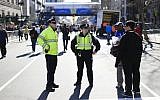 Illustrative: Police stand by near the finish line of the 118th Boston Marathon in Boston, Massachusetts, April 20, 2014. (AP/Matt Rourke)
