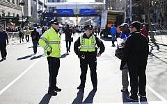 Illustrative: Police stand by near the finish line of the 118th Boston Marathon in Boston, Massachusetts, April 20, 2014. (AP/Matt Rourke)
