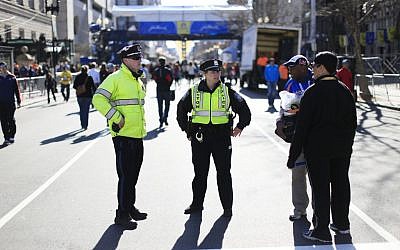 Illustrative: Police stand by near the finish line of the 118th Boston Marathon in Boston, Massachusetts, April 20, 2014. (AP/Matt Rourke)