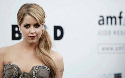 British socialite Peaches Geldof arrives for the amfAR Cinema Against AIDS benefit at the Hotel du Cap-Eden-Roc, during the 62nd Cannes International film festival, in Antibes, southern France, Thursday, May 21, 2009. (AP Photo/Matt Sayles, File)