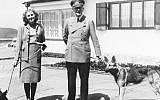 Adolf Hitler and Eva Braun walking their dogs, 1942. (German Federal Archive)