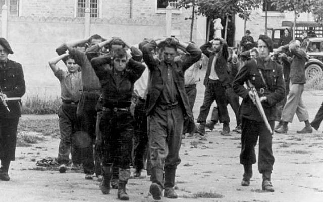 French resistance fighters held by Vichy regime militias during World War II (Photo credit: CC-BY-SA German Federal Archive Wikimedia Commons) French resistance fighters held by Vichy regime militias during World War II. (Photo credit: CC-BY-SA German Federal Archive Wikimedia Commons)