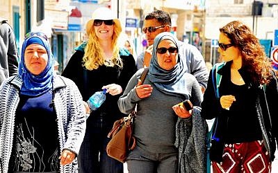 Participants of Tiyul-Rihla walk through the streets of Bethlehem, April 4, 2014 (photo credit: copyright/Bruce Shaffer)