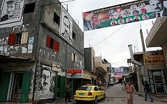 Graffiti and banners are seen in Dheisheh refugee camp, near Bethlehem (Maya Levin/Flash90/File)