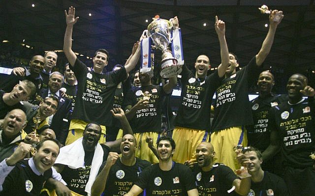 Maccabi Tel Aviv celebrates after winning the final game against Rishon Lezion in the Israeli Basketball Super League in 2012 (photo credit: Flash90) Maccabi Tel Aviv celebrates after winning the final game against Rishon Lezion in the Israeli Basketball Super League in 2012 (photo credit: Flash90)