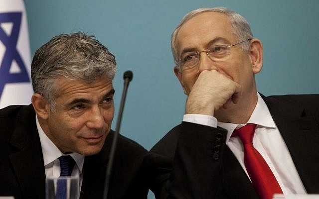 Finance Minister Yair Lapid with Prime Minister Benjamin Netanyahu. (Photo credit: Flash90)