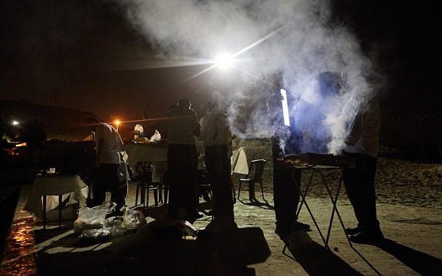 Illustration. Ultra-Orthodox Jewish men seen doing barbecue. (photo credit: Yaakov Naumi/Flash90)