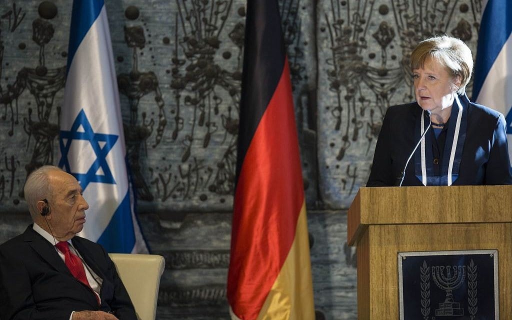 President Shimon Peres listens to German Chancellor Angela Merkel at the president's residence in Jerusalem, February 25, 2014. (Photo credit: Yonatan Sindel/Flash90) President Shimon Peres listens to German Chancellor Angela Merkel at the president's residence in Jerusalem, February 25, 2014. (Photo credit: Yonatan Sindel/Flash90)